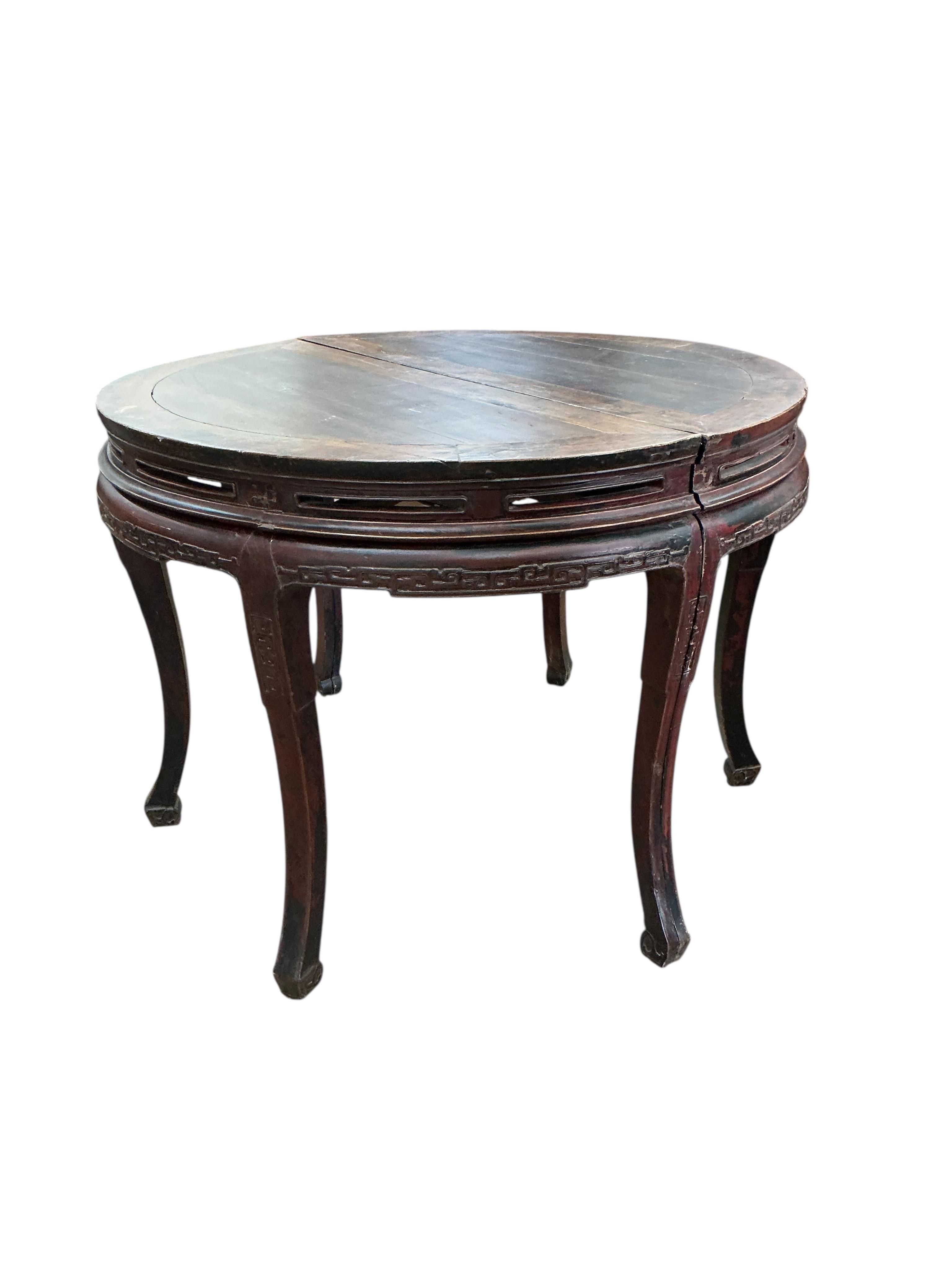 A pair of Chinese part lacquered demi lune console tables, width 124cm, depth 63cm, height 90cm